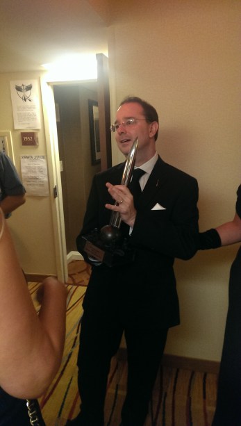 John Scalzi poses with his Hugo for best novel, about an hour after he won it. He seemed dazed.